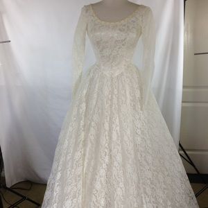 Vintage wedding dress.  Lots of lace size 4