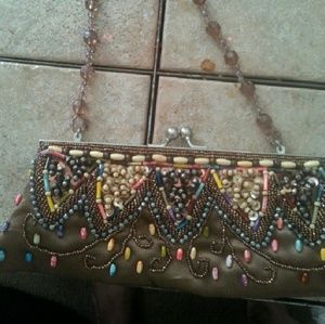 Silk , beaded clutch