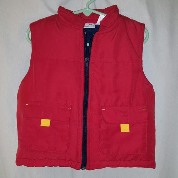 Really cute red vest trimmed in navy blue fleece