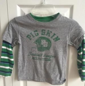 Long sleeve T shirt , does have small stain, haven't tried to wash it though , may come out