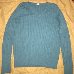 Blue v-neck cable knit sweater