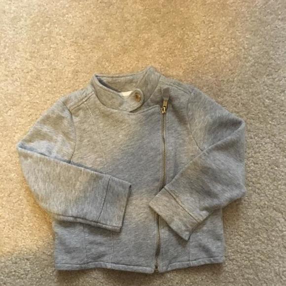 Grey Motorcycle style zip up sweatshirt.