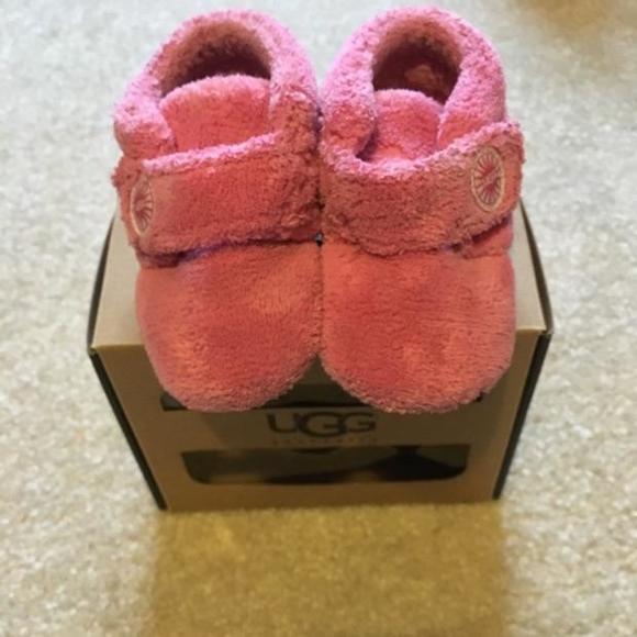 Ugg pink girls slippers.