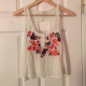 White PacSun cropped tank with flowers.