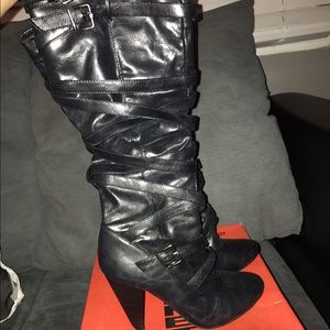 Black high heeled boots
