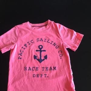 Pink and blue shirt.