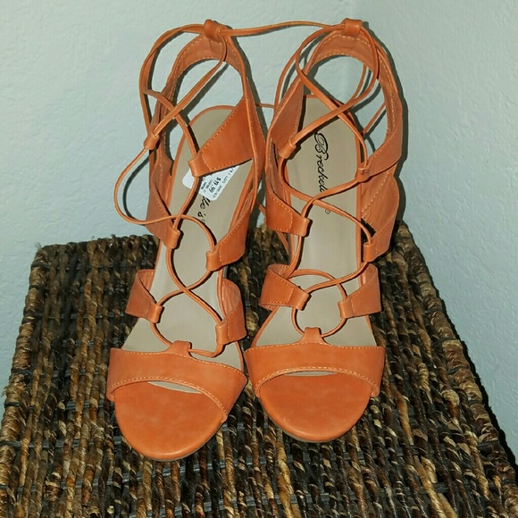 Orange Lace up sandal. Never worn