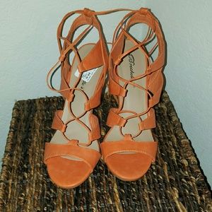 Orange Lace up sandal. Never worn