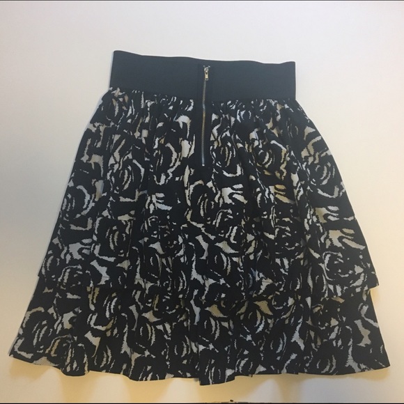 Black floral knee length skirt with exposed zipper
