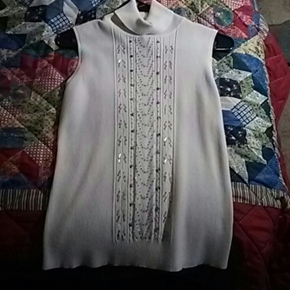 NWOT.  Beautiful White sleeveless turtleneck!!