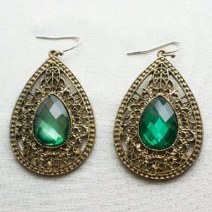Gold tone and green earrings