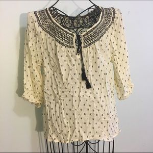 Cream and black patterned shirt