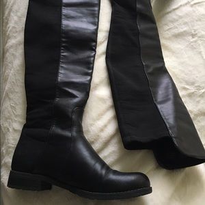 Knee high Unisa black boots with stretch calf