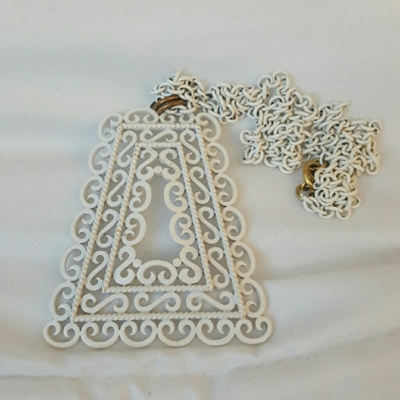 White  vintage statement necklace.