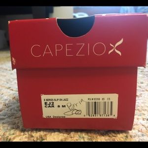 On Hold Capezio tan jazz shoes