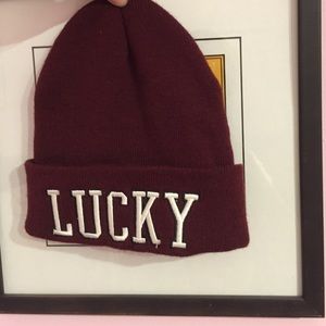 Beanie with word print; "lucky"