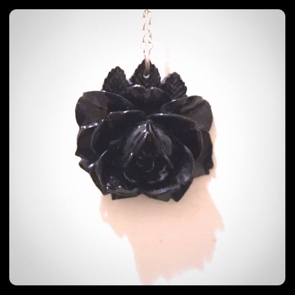 Chunky black flower pendant on silver chain