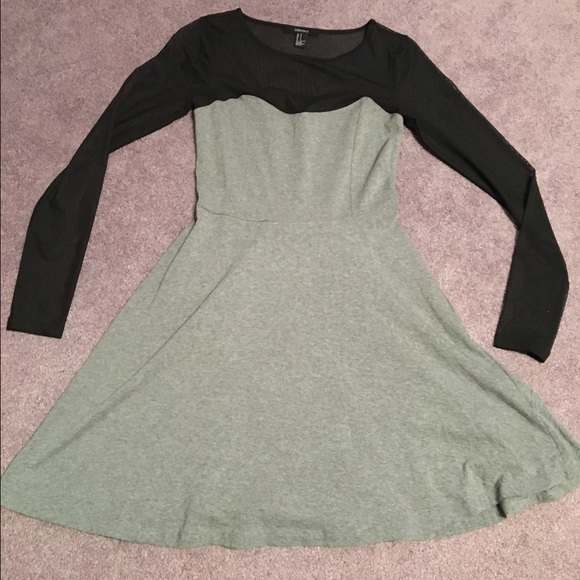Grey and black dress with black mesh top.