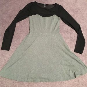 Grey and black dress with black mesh top.