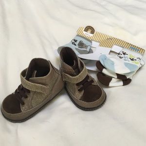 Baby boots and 3 pairs of nwt socks.