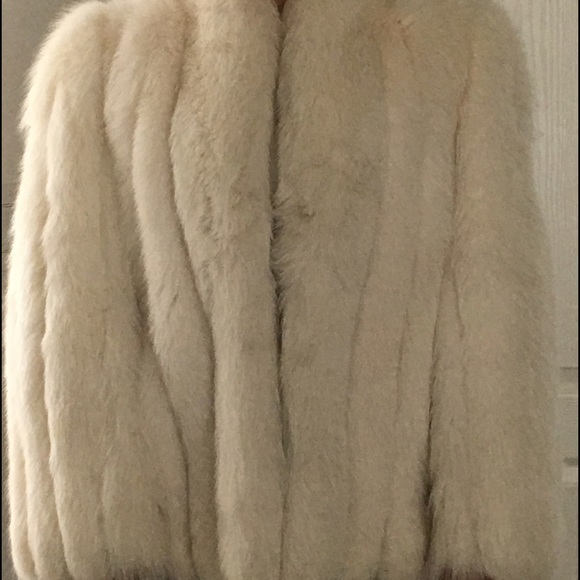Baby, it's cold outside!  White fox jacket.