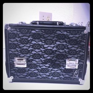 Caboodle black lace case. Ht8.75 leng11.250