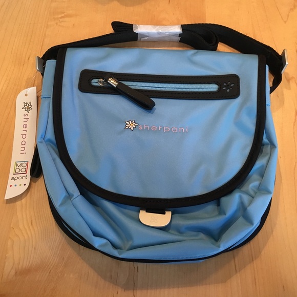 Light Blue Sherpani Cross Body Purse
