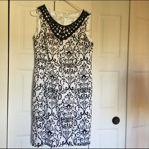 White and black print dress, crochet/cabuchon trim