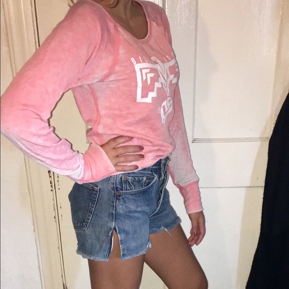 Salmon BillaBong Sweater. Levi Shorts