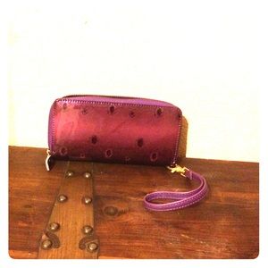 Purple with faint dandelion design purse.