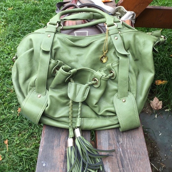 Slightly used green Big Buddha purse