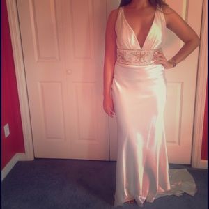 Floor length white satin evening gown