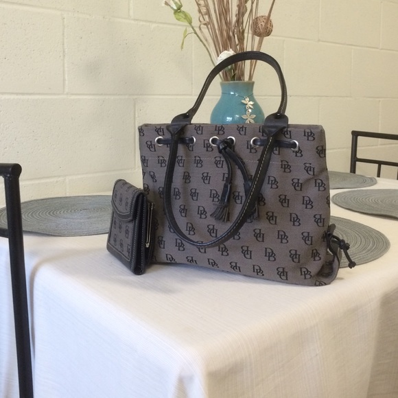 Dooney and brouke inc.'s grey brown shoulder bag