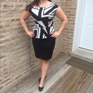 Black and white peplum blouse w/ zipper