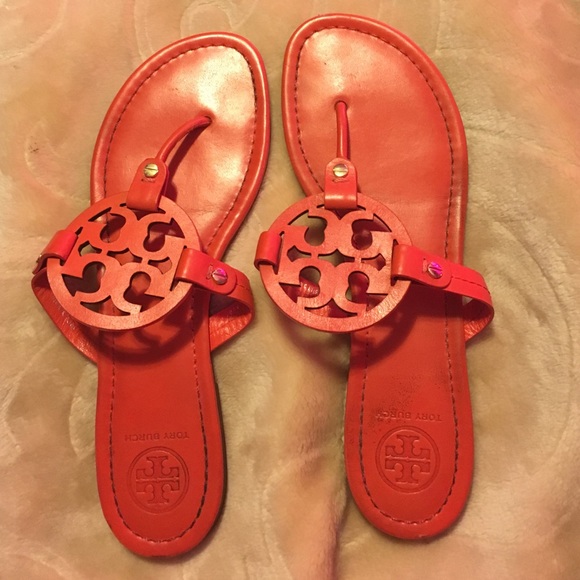 Tory Burch orange flip flops