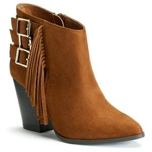 Jennifer Lopez fringe ankle boots.