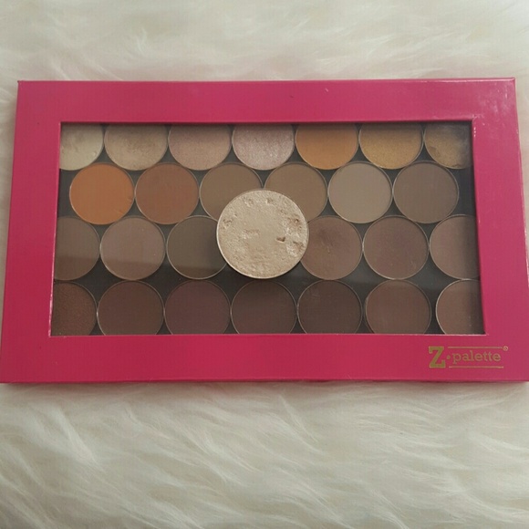 One Z palette along with 27 single eyeshadows