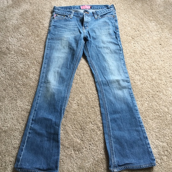 Light blue with pink stitching on backpockets