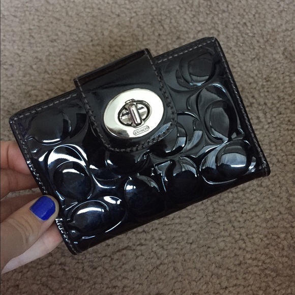 Shiny black coach wallet