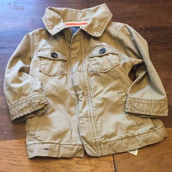 Cute cargo jacket size 9 months with ink marks on arm and Front jacket.  Priced to sell cheap!!