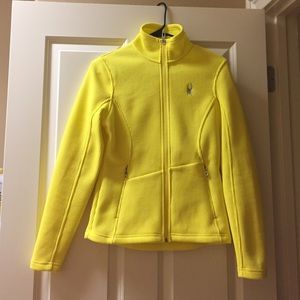 Spyder yellow ski jacket.