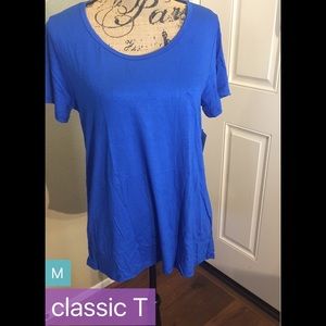 Pretty blue classic T from LuLaRoe. Size medium.