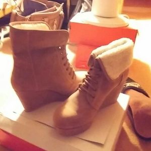 Fur lined boots wedge. Never worn.