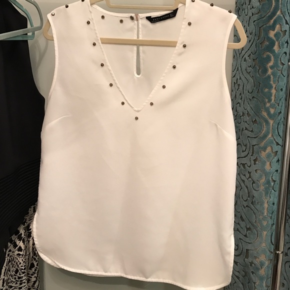 Zara sleeveless blouse with studded detail.