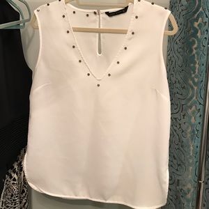 Zara sleeveless blouse with studded detail.