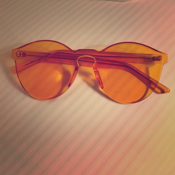 Orange frameless sunglasses