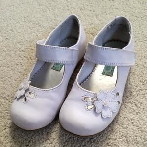 Rachel white Mary Jane with cut out flower.