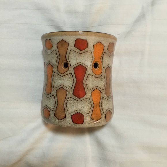 Scentsy plug-in and element warmer.