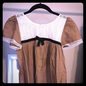 Cute cotton top. Lace trim & bow.