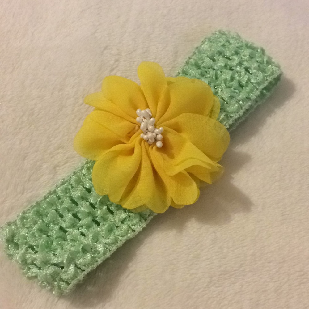 Mint green crochet hair band with flower detail
